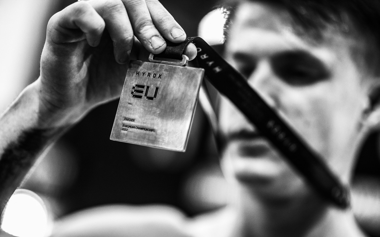 Athlete showing his European Championships Medal